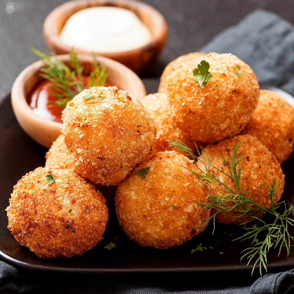 Cheese balls with tomato and basil
